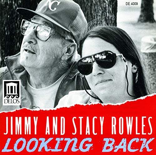 "CD cover featuring black-and-white photo of man and woman wearing sunglasses and earbuds."