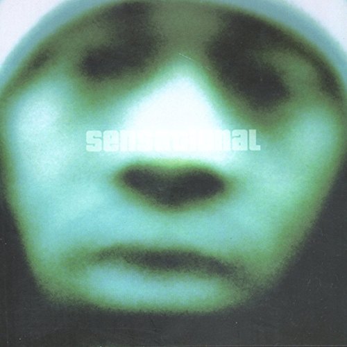 CD cover with a blurry, green-toned image of a human face.