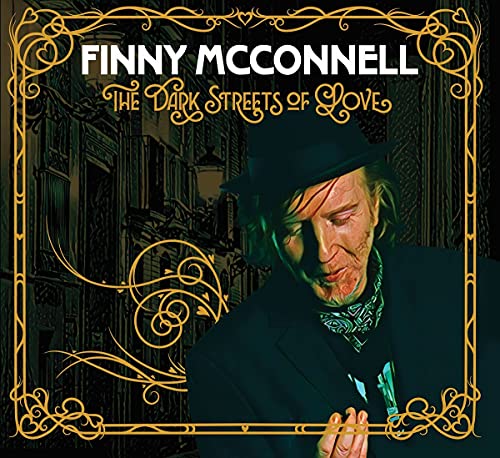 CD cover: Finny McConnell in a hat, with a city background.