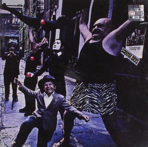 "Album cover with surreal image of people in a narrow street, various poses and attire."