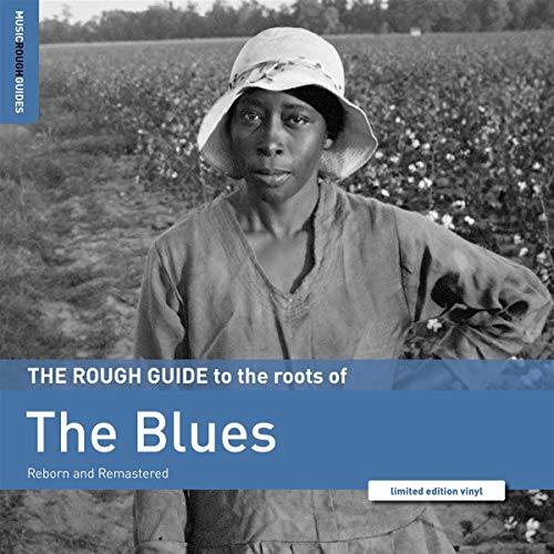 Black and white vinyl album cover featuring a man in a hat in a cotton field.