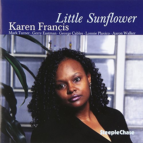"Karen Francis' album cover featuring a woman with curly hair and a black top."