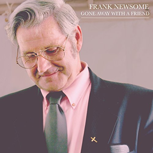 "Album cover featuring a man in a suit, pink shirt, and tie."