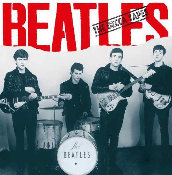 The Beatles album cover, black and white photo of the band with instruments.