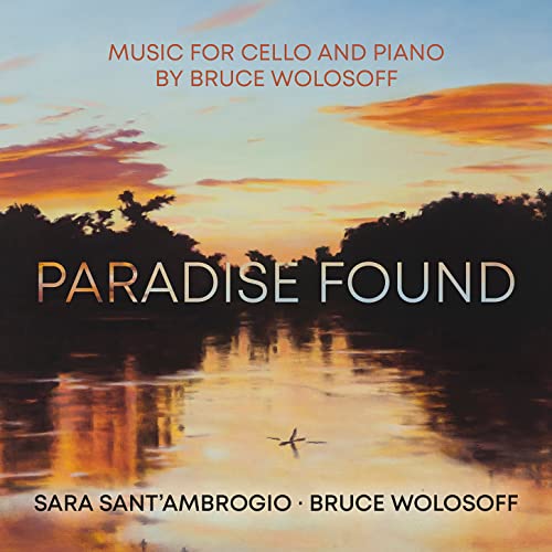 CD cover for "Paradise Found" with sunset over water and silhouetted trees.