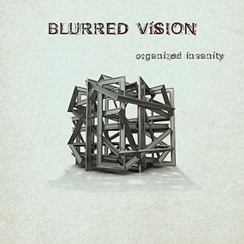"Album cover with 'Blurred Vision' title and abstract metal cube on beige background."