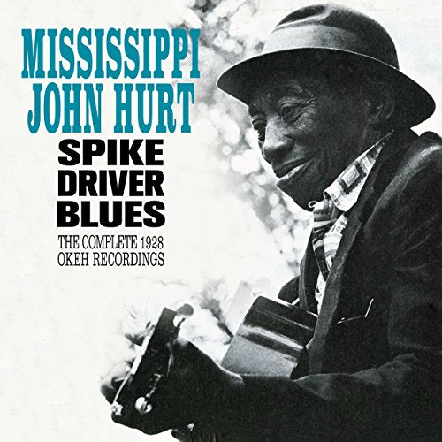 Black and white photo of Mississippi John Hurt playing guitar, with album title text.