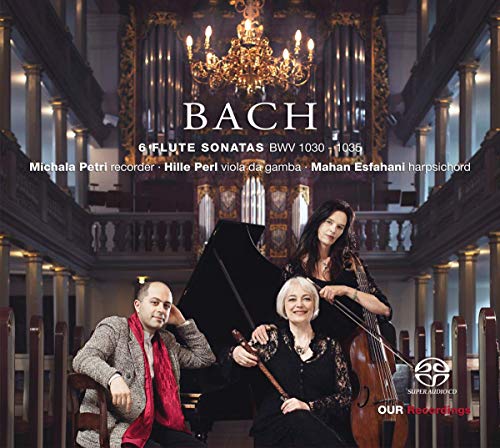 Three musicians with instruments in a church interior, album cover.