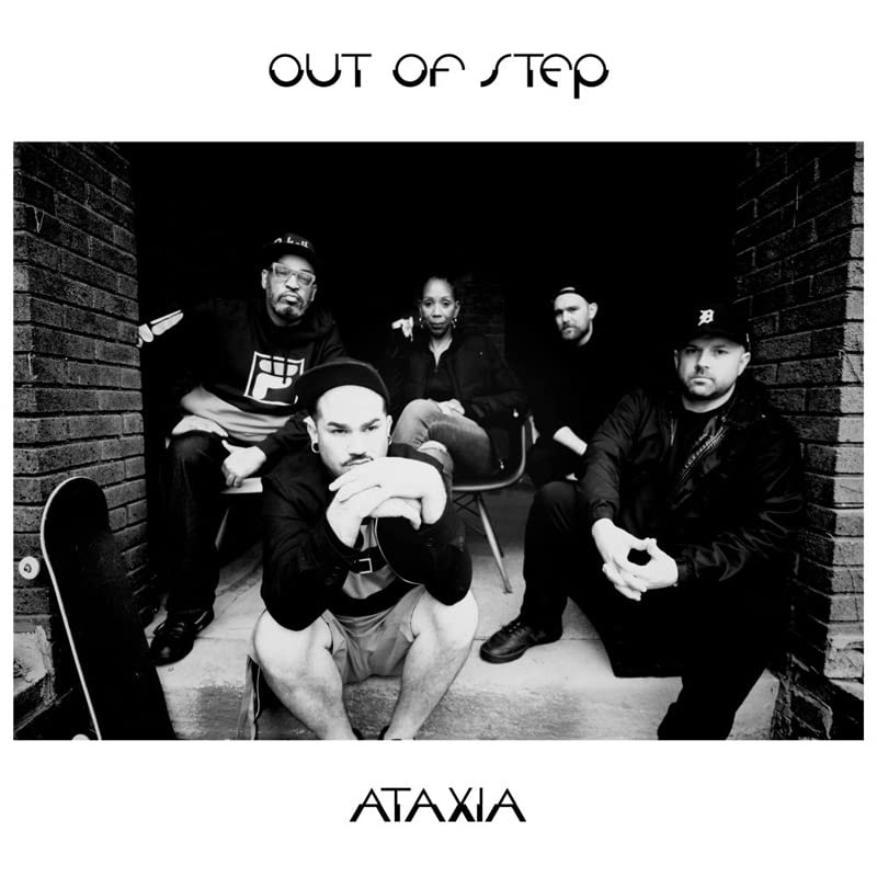 Black and white photo of six people posing outdoors, album cover.