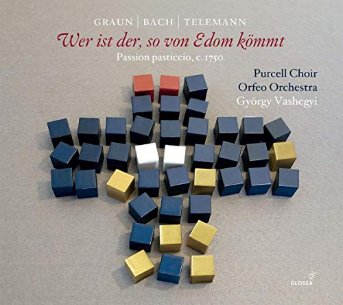 "CD cover with multicolored wooden blocks forming a cross on a grey background."