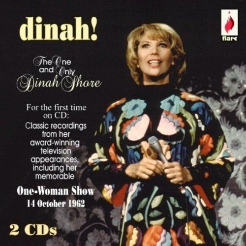 "CD cover featuring Dinah Shore holding a microphone, wearing a floral dress."