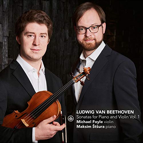 "CD cover featuring two men, one holding a violin, in formal attire."