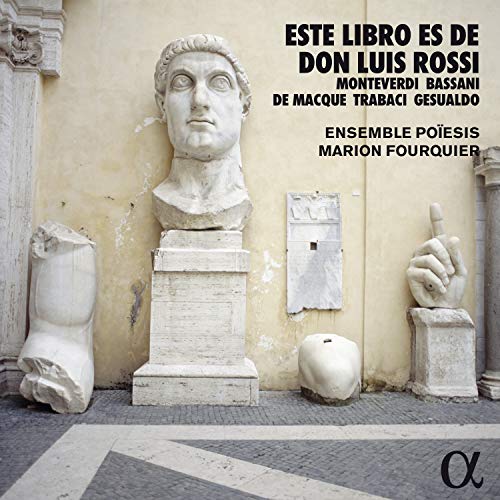 "CD cover featuring broken marble statues against a beige wall with black text."