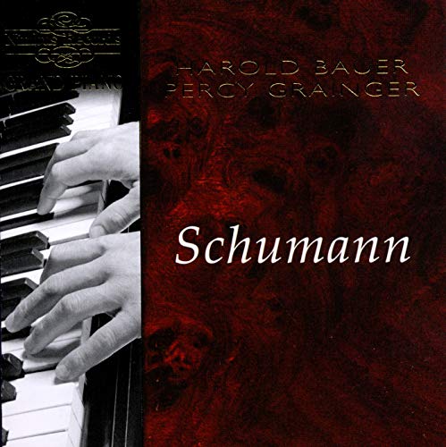 CD cover featuring piano keys, hands, and the name "Schumann" in silver text.