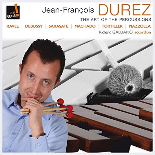 CD cover featuring a man with mallets and a xylophone.