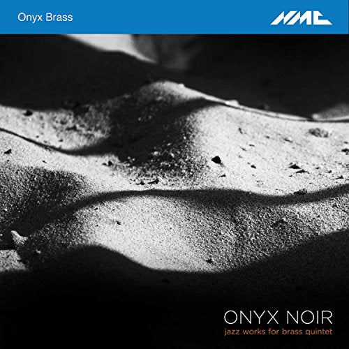 Black and white sand image with blue banner and white and orange text overlay.