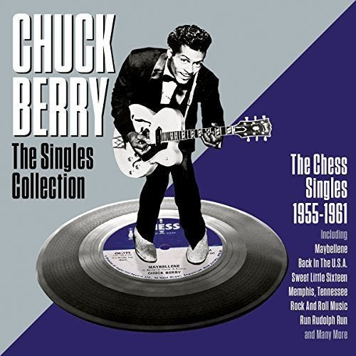 Chuck Berry album cover featuring a man in a suit playing a white guitar.