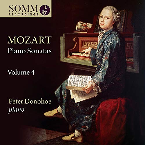 CD cover featuring Mozart at a piano, wearing 18th-century attire, playing with sheet music.