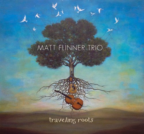 "Album cover art featuring a tree with guitar roots against a blue sky."