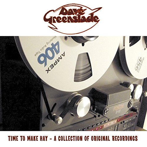 "Album cover featuring a close-up of a reel-to-reel tape recorder."