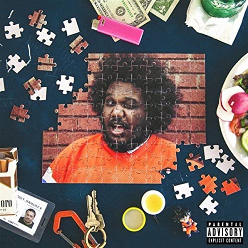 CD cover for Michael Christmas’ “WHAT A WEIRD DAY” featuring a portrait and scattered objects.