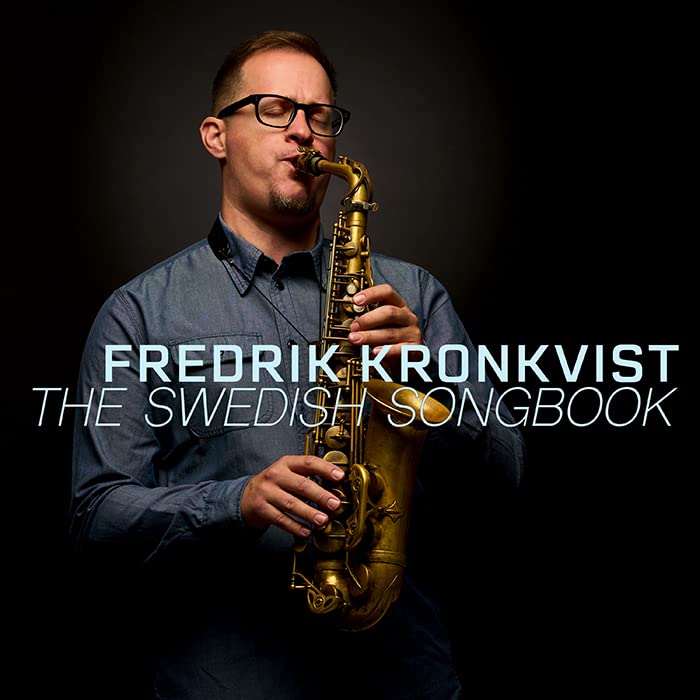 Fredrik Kronkvist plays saxophone on album cover, "The Swedish Songbook.