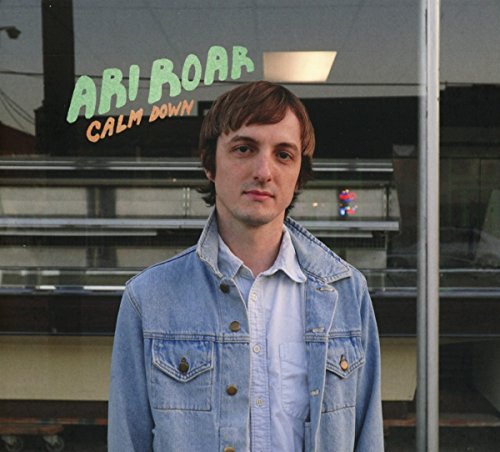 CD cover for Ari Roar’s “Calm Down” featuring a young man’s portrait.