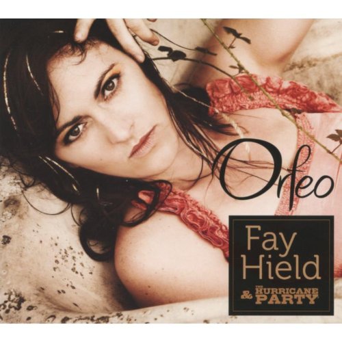 Album cover featuring a woman lying down with a flower in her hair.