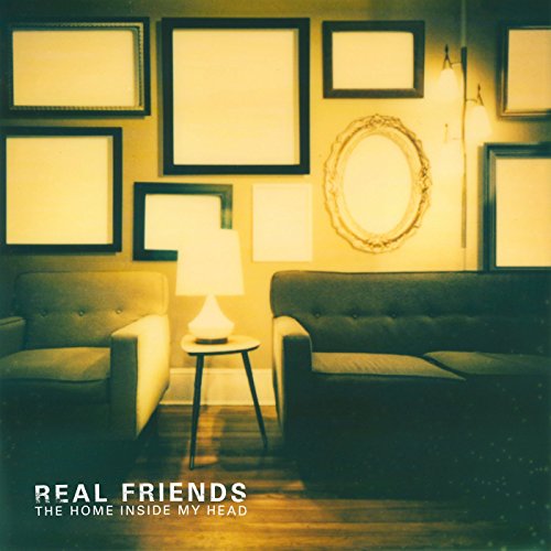 Album cover with two couches, lamp, and blank frames on a yellow-toned wall.