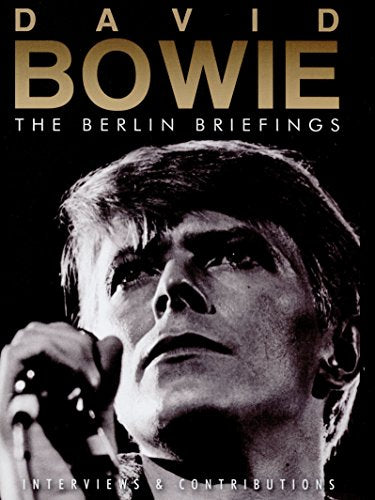Black and white David Bowie DVD cover with gold text and close-up of his face.