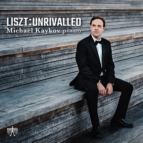 CD cover featuring pianist Michael Kaykov in formal wear.