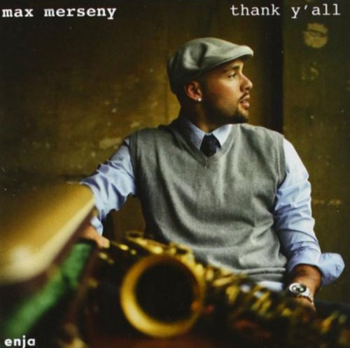 "Album cover featuring a man holding a saxophone, wearing a cap and sweater vest."