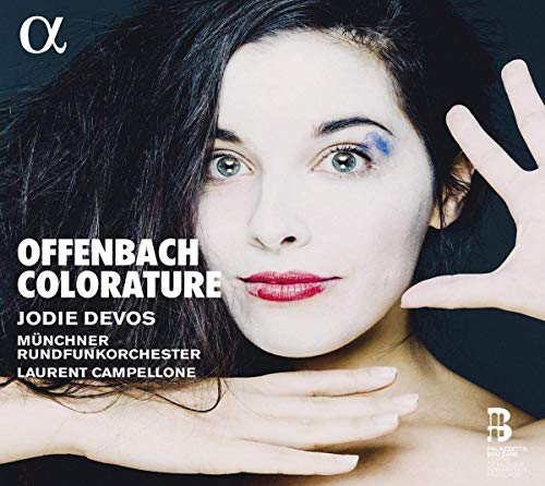 CD cover featuring a woman with dark hair and blue eye makeup.