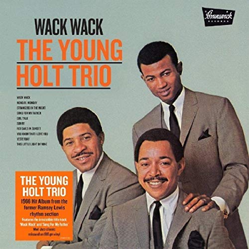 Album cover for “Wack Wack” by The Young Holt Trio, three men in suits.