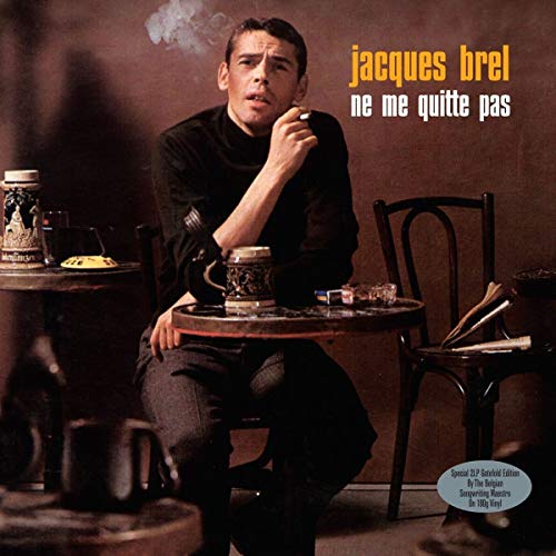 Jacques Brel portrait on album cover, with a table and moody lighting.