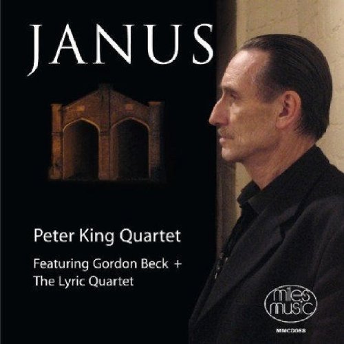 "CD cover with a man in black and 'Janus' title."