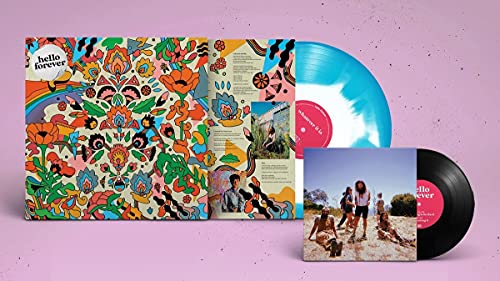 Colorful floral vinyl record packaging with insert and record discs.