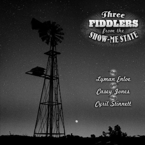 "CD cover featuring a windmill against a starry night sky with yellow text."