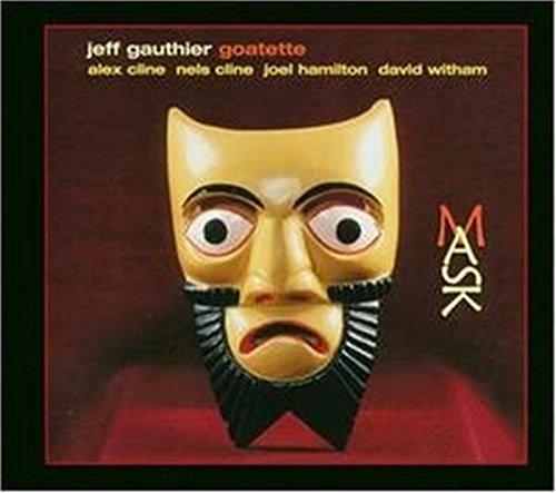Album cover featuring a gold mask with a black beard on red background.