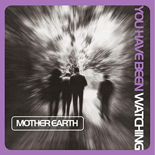 Vinyl record cover with silhouetted figures against a swirling, dark background.