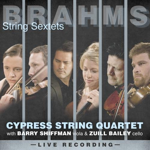 CD cover featuring six musicians with string instruments against a dark background.