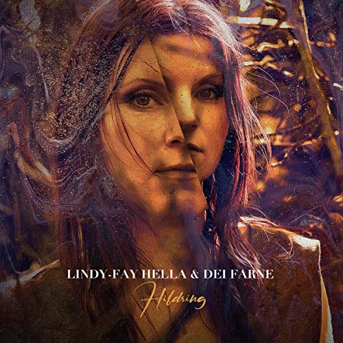 CD cover featuring a woman’s portrait with blurred, textured background.