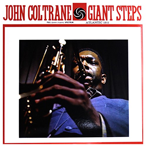"Album cover featuring John Coltrane playing saxophone, with red title and white border."