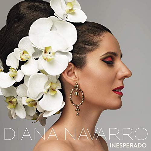 Diana Navarro album cover, profile view with white orchids and gold earrings.