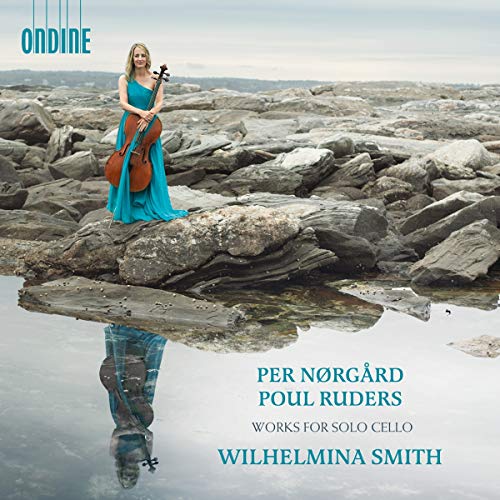 Cellist Wilhelmina Smith on rocky shore, album cover for Nørgård & Ruders.