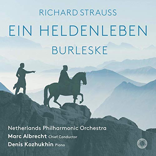 "CD cover with silhouetted figures on horseback and rocky mountains in blue tones."