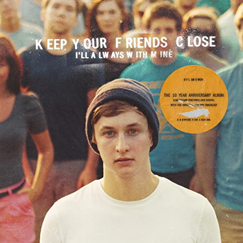 Album cover for Owen’s “Keep Your Friends Close” with a portrait and vinyl record.