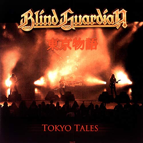 Vinyl album cover featuring a band performing on stage with spotlights and audience.