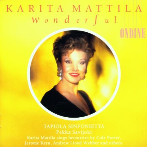 "Album cover with a woman's portrait on a yellow background, titled 'Wonderful'."