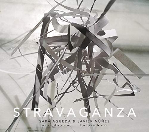 "CD cover featuring twisted silver ribbons and the title 'Stravaganza' in white text."